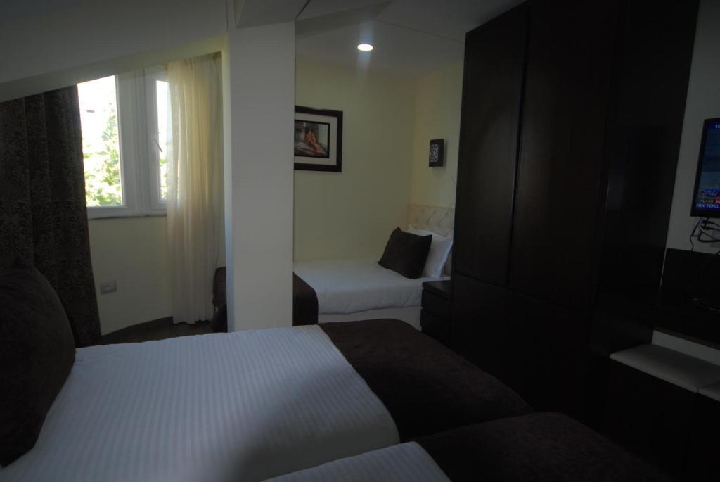 Hotel Town House Tirana Camera foto